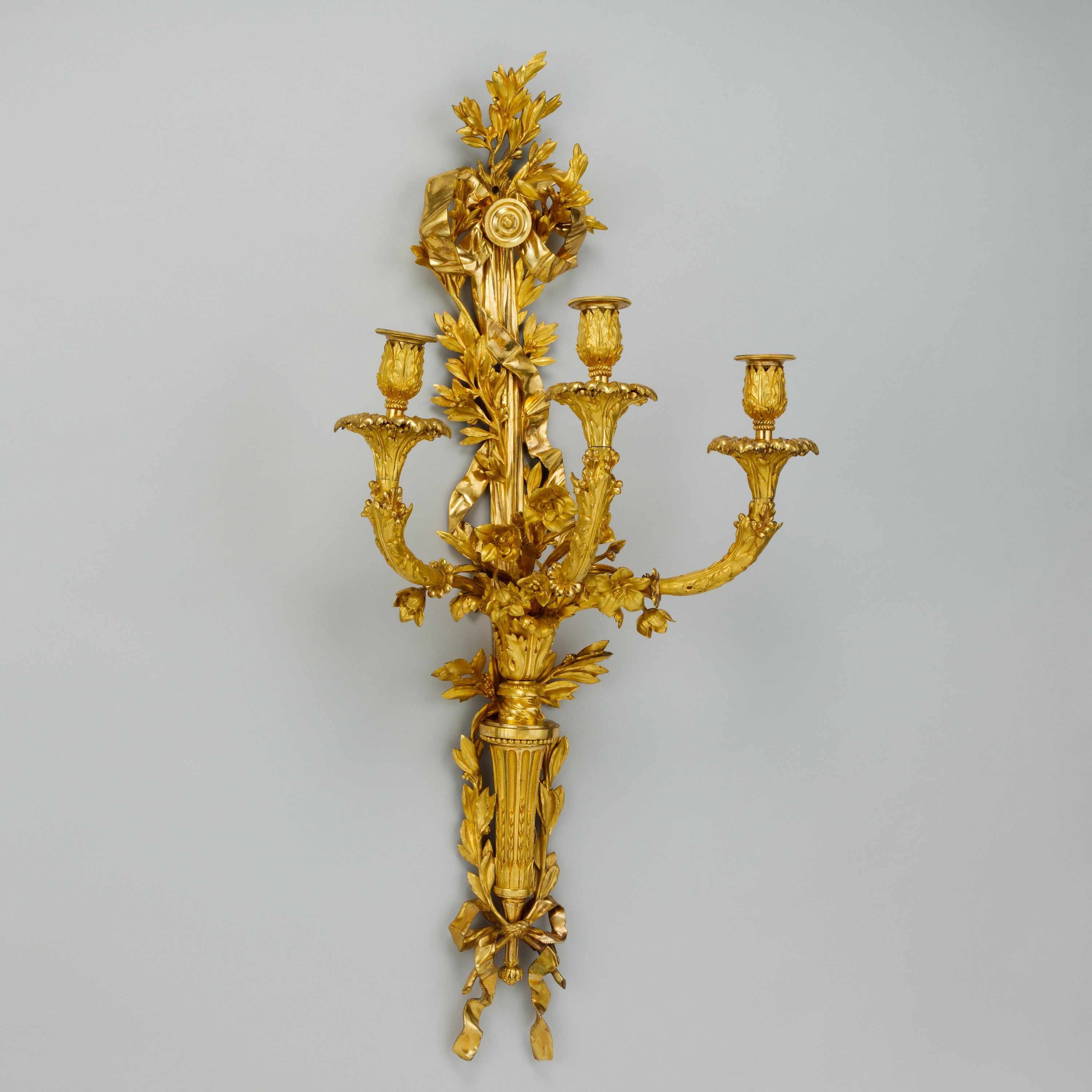 Set of four three-light wall brackets