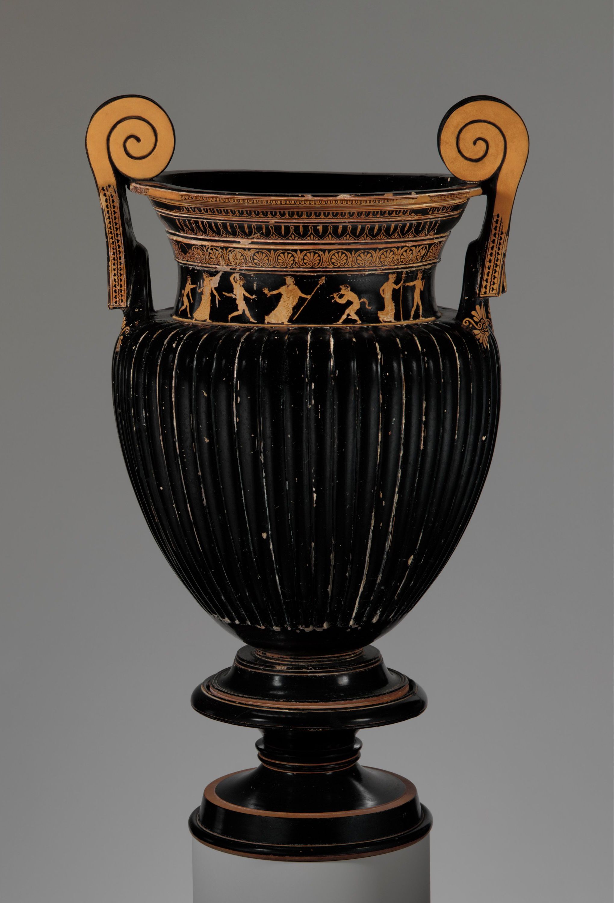 Terracotta volute-krater (bowl for mixing wine and water) with stand