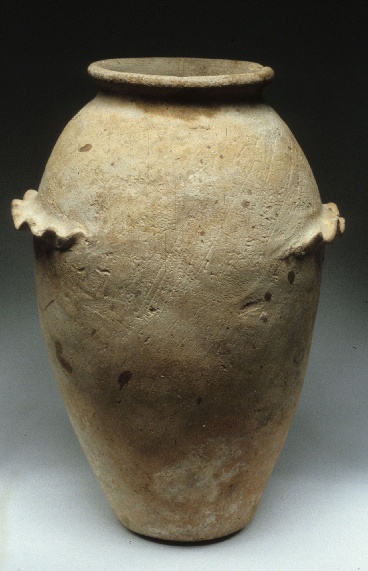 Wavy-handled ware jar