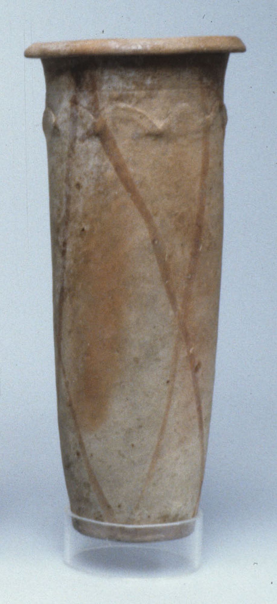 Wavy-handled jar with cross-hatched design