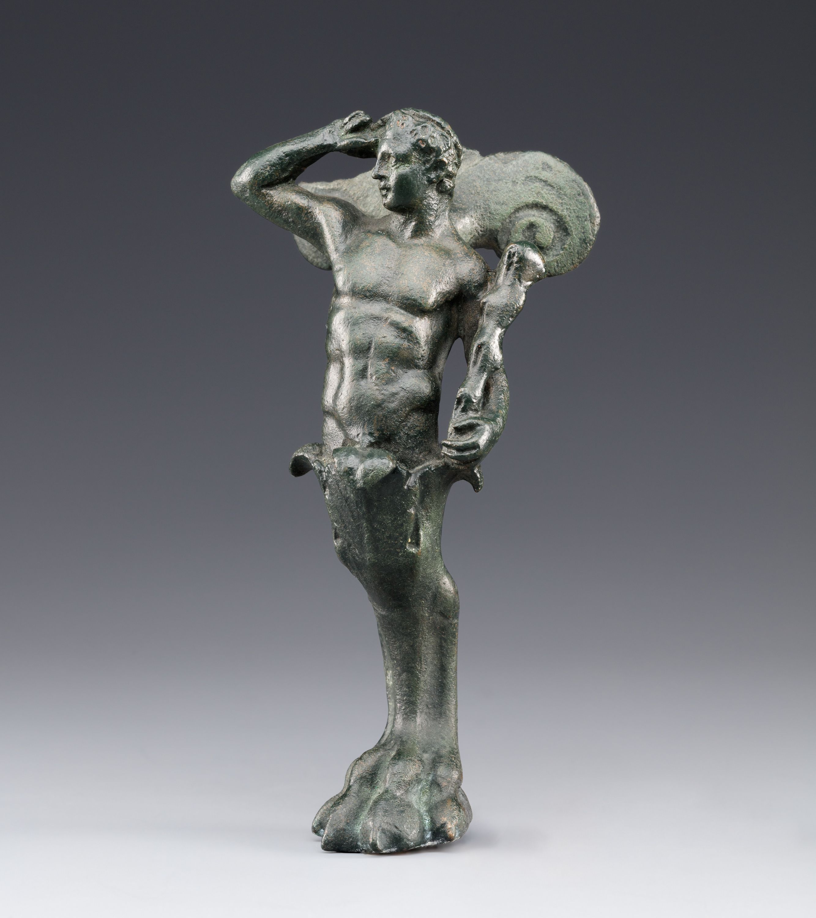 Vessel support combining the upper body of Herakles and a lion's foot