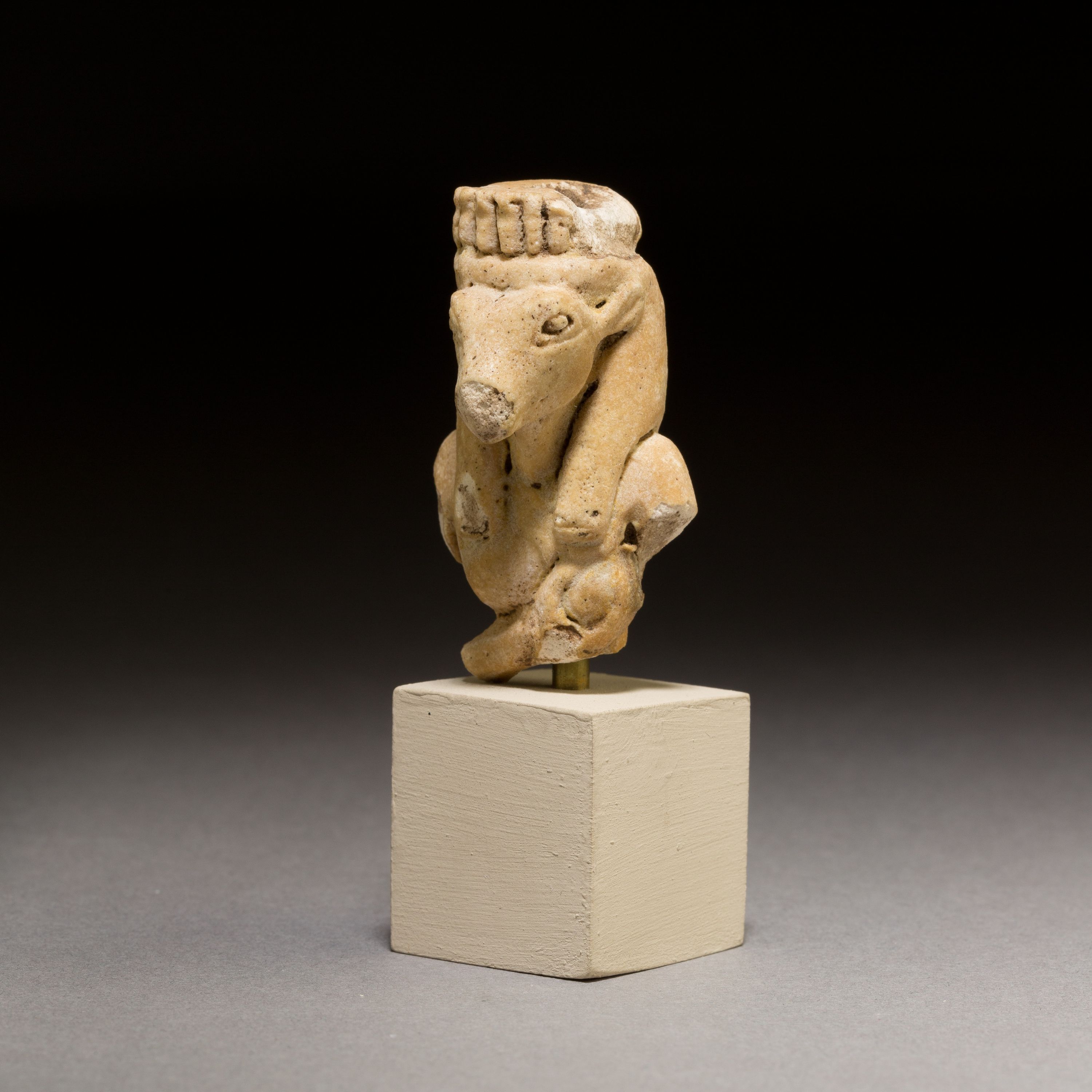 Upper part of a statuette of the Mother of the Apis