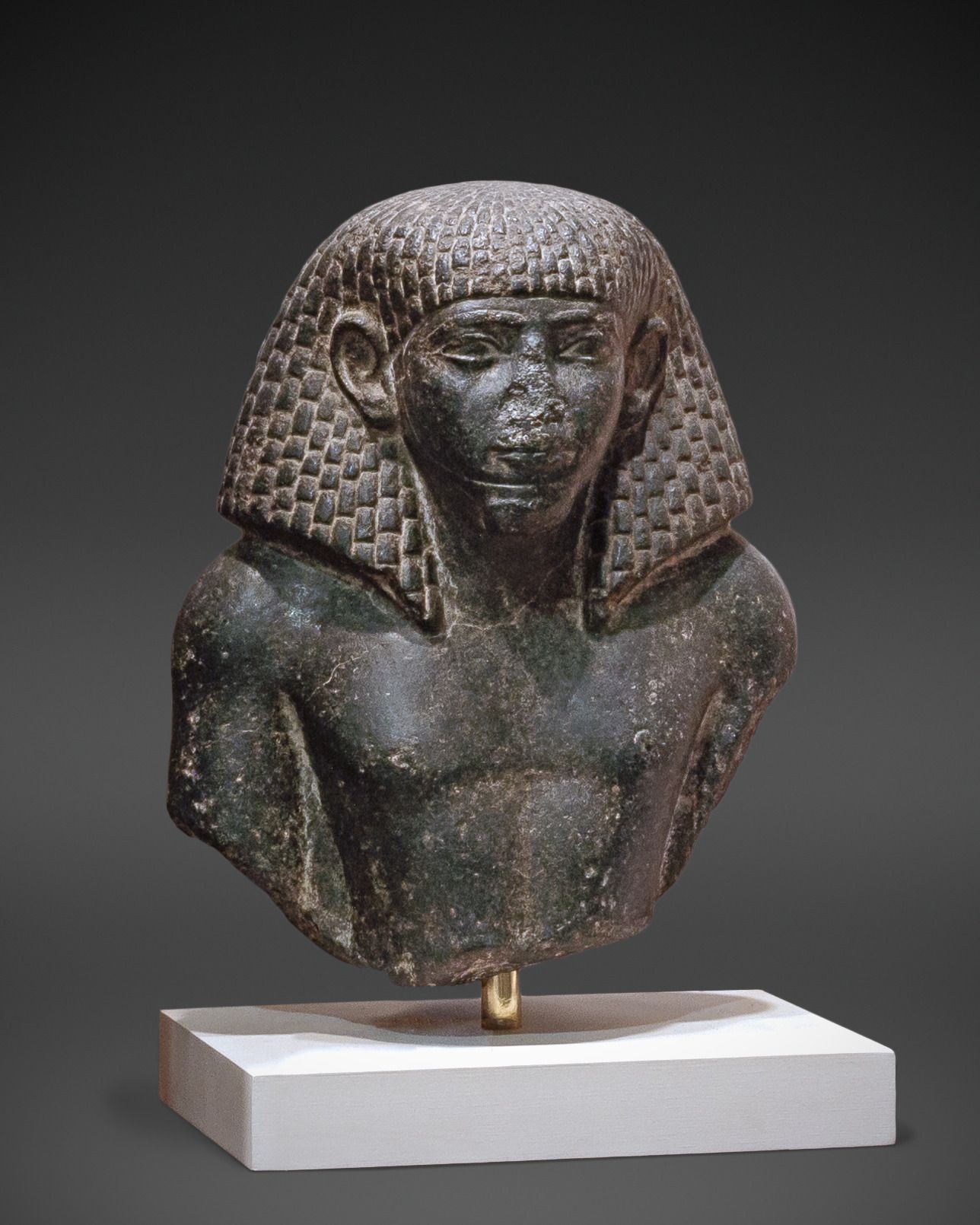 Upper Part of a Statue of a Man