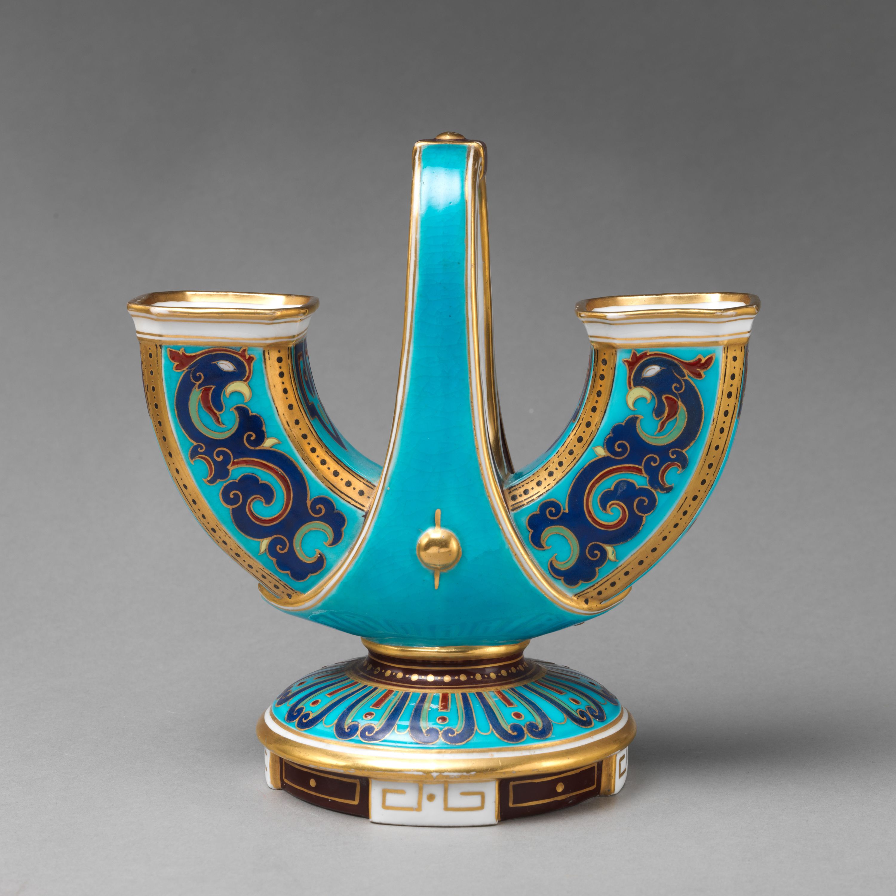 U-shaped vase with handle (one of a pair) by Minton(s)